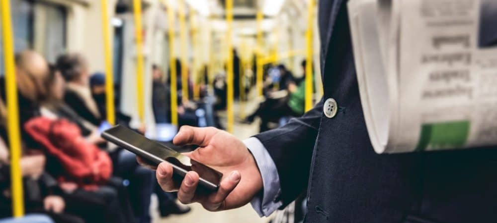 Reading smartphone commute subway featured