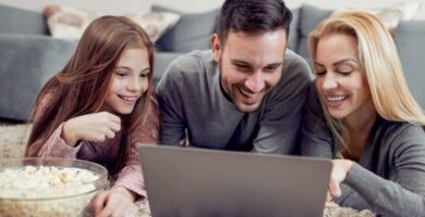 family watching movie computer popcorn featured 1000x450