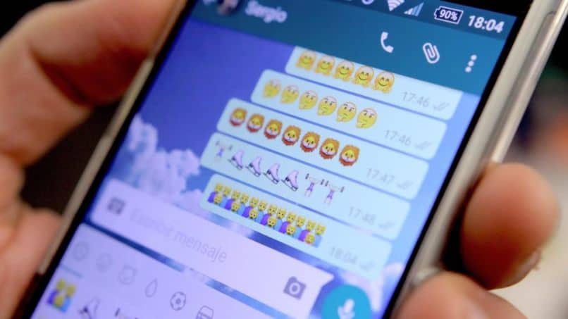 movil mano emojis