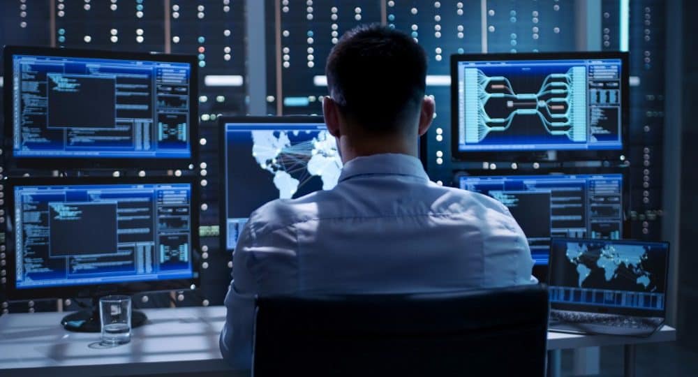 system security specialist working at system control center room is picture id808157766